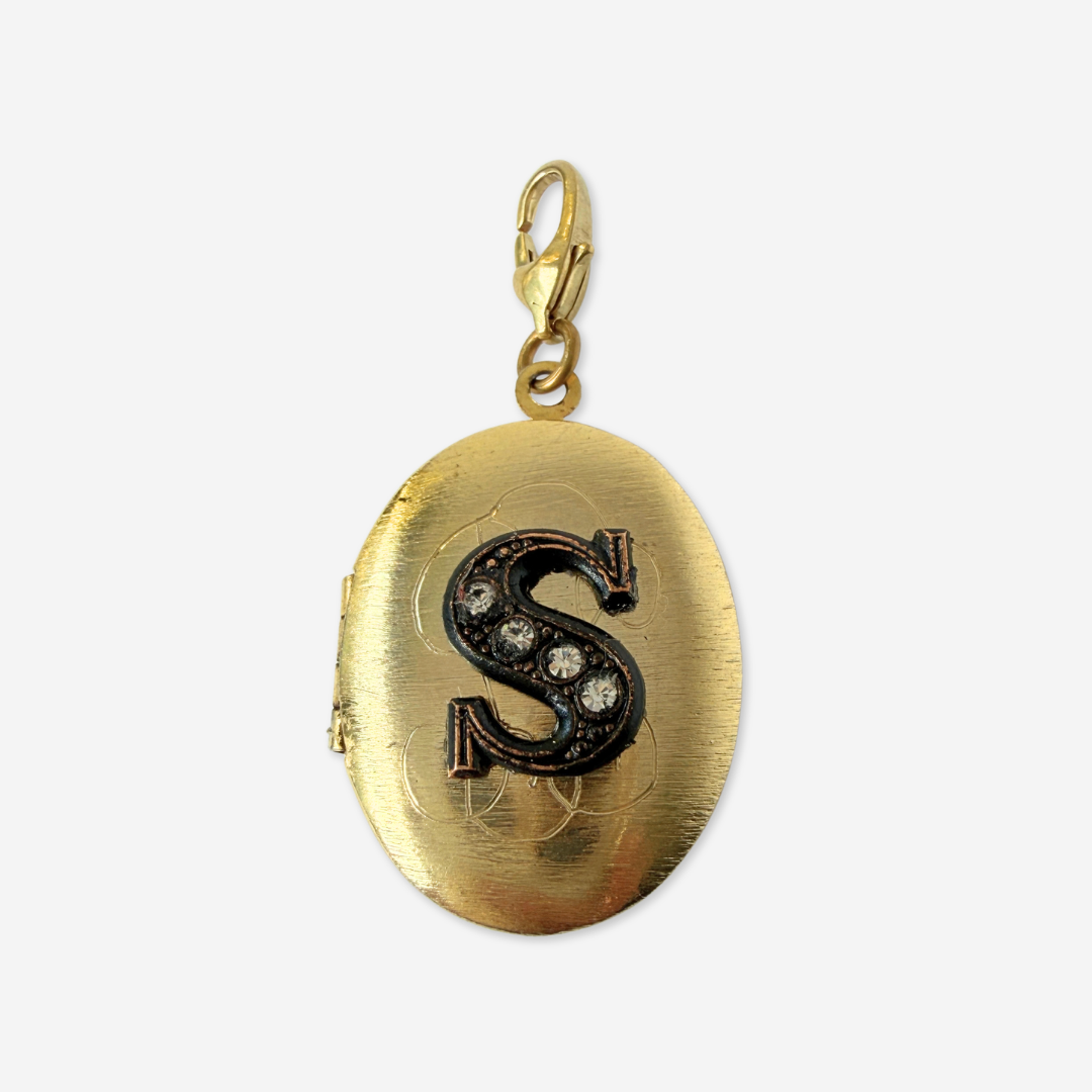 Vintage brass oval locket charm with black rhinestone letter "S"