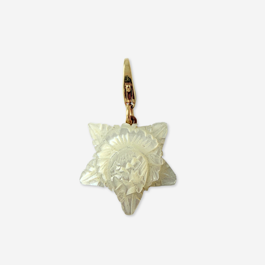 Vintage carved mother of pearl star flower charm