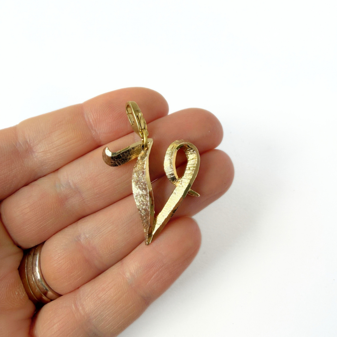 Large vintage gold tone letter "V" monogram charm