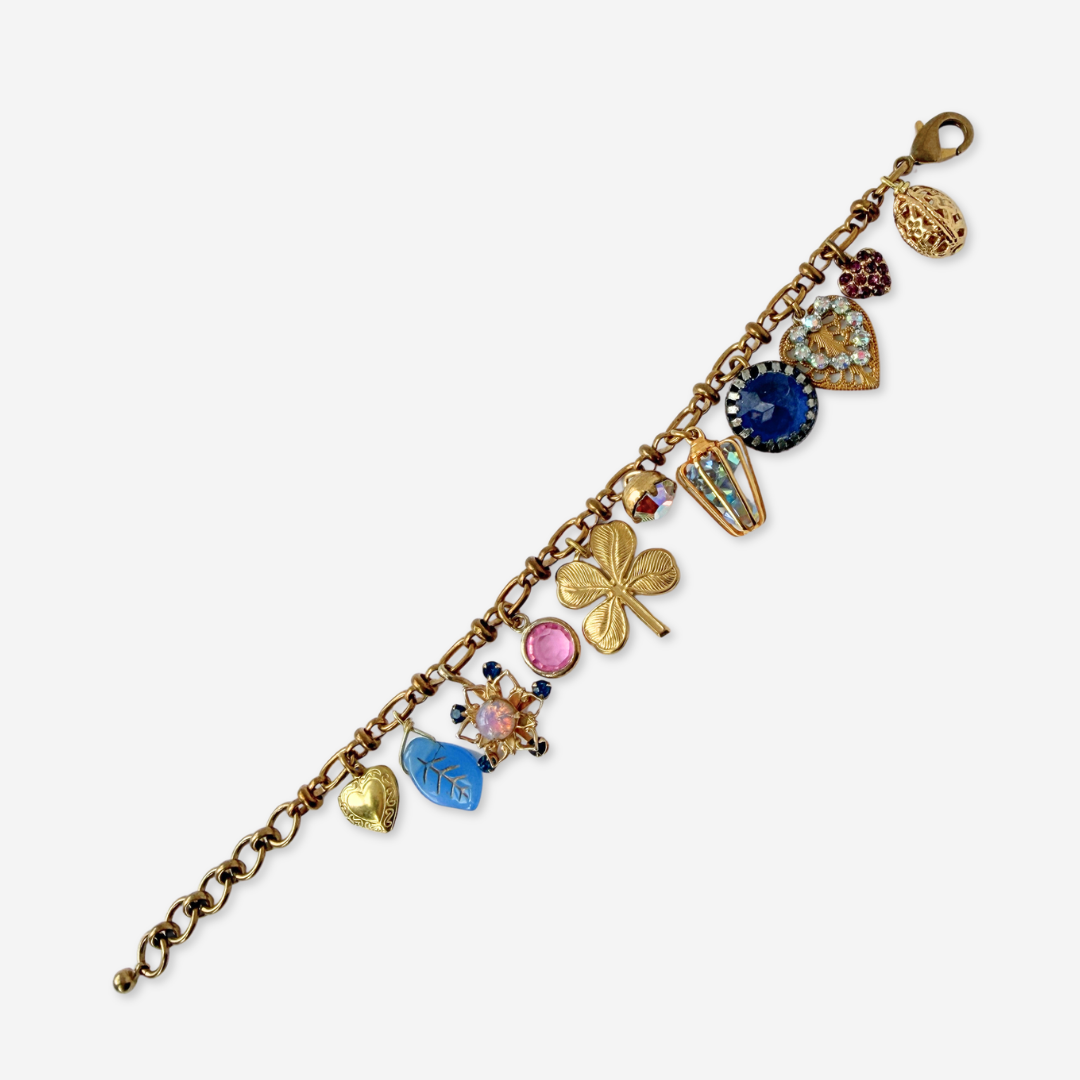 Repurposed vintage pink and blue mixed charm bracelet
