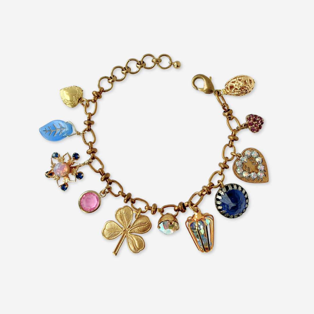 Repurposed vintage pink and blue mixed charm bracelet