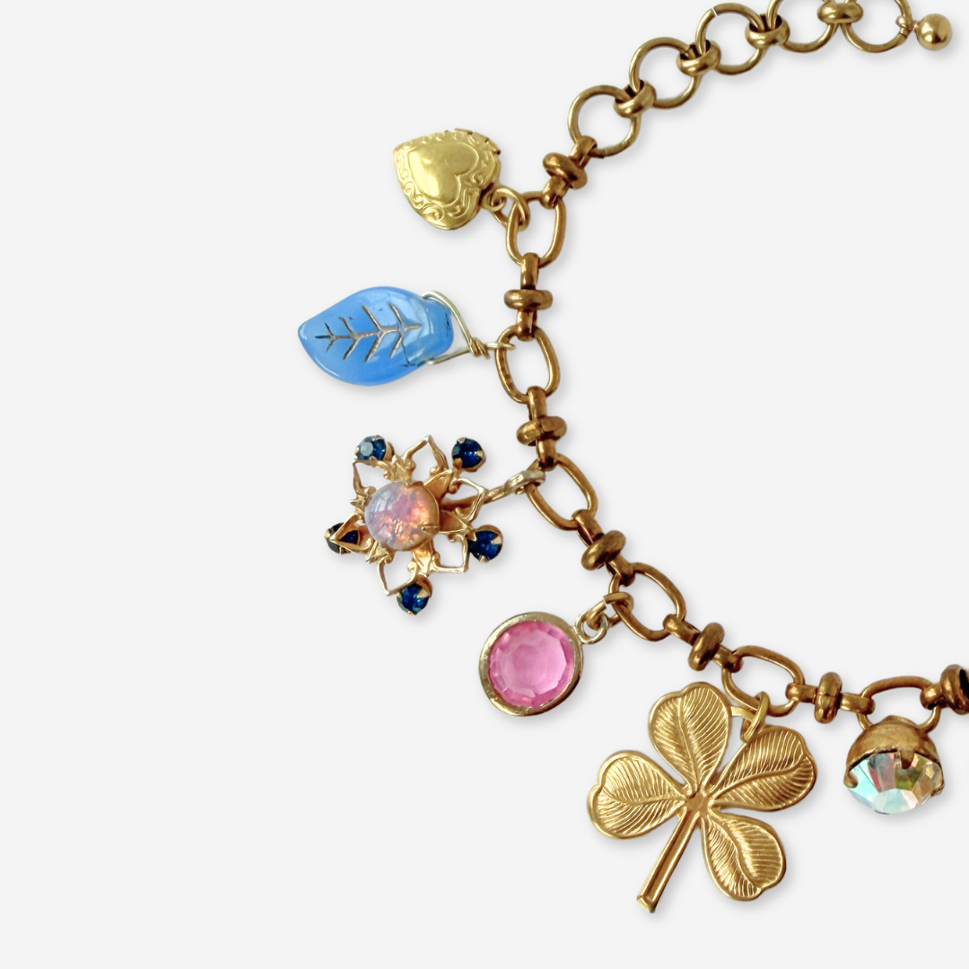 Repurposed vintage pink and blue mixed charm bracelet