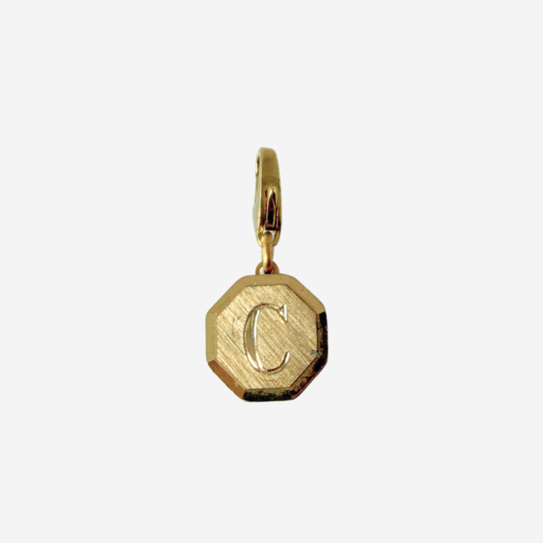 Small vintage gold octagonal "C"monogram charm