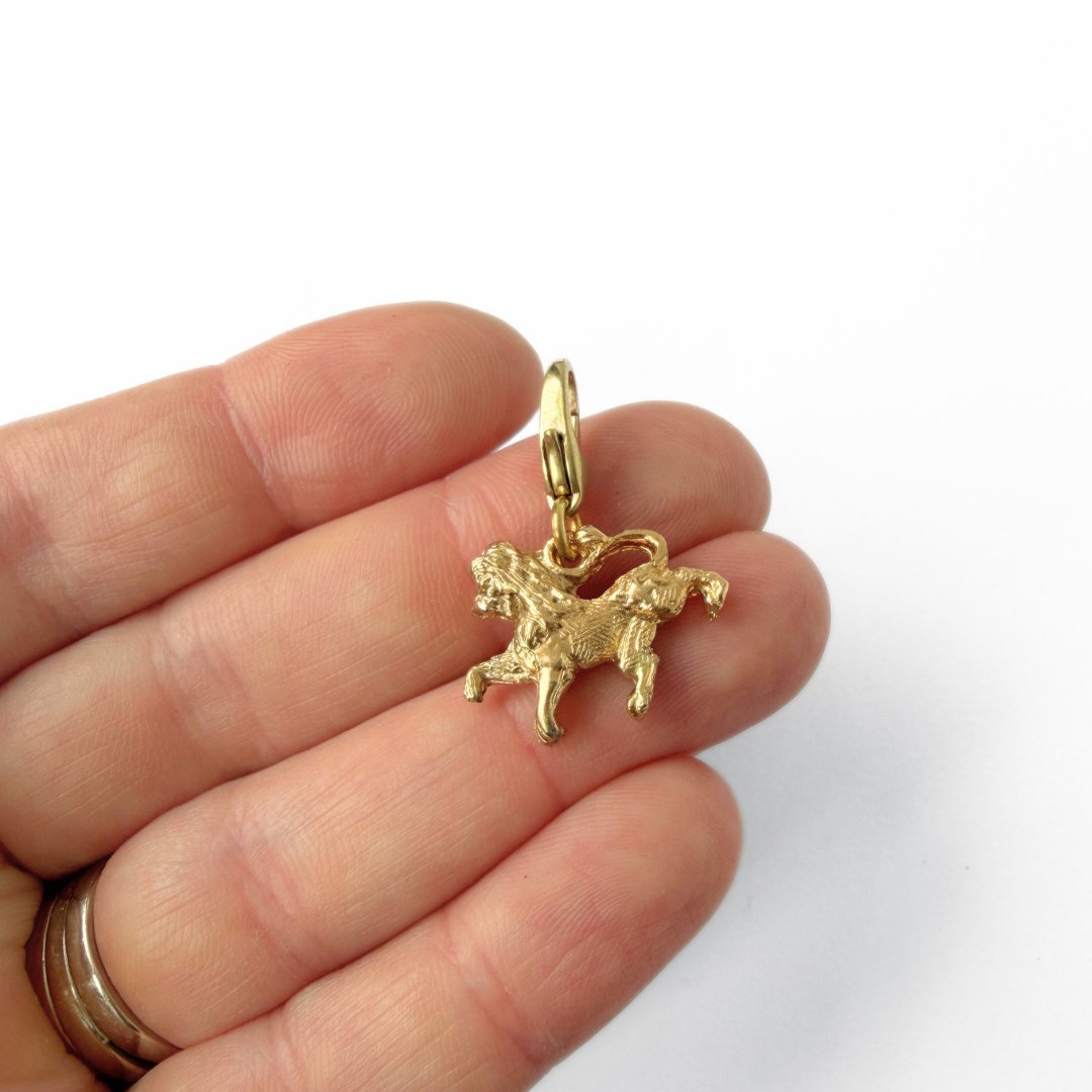 Small vintage gold tone Leo the Lion Charm