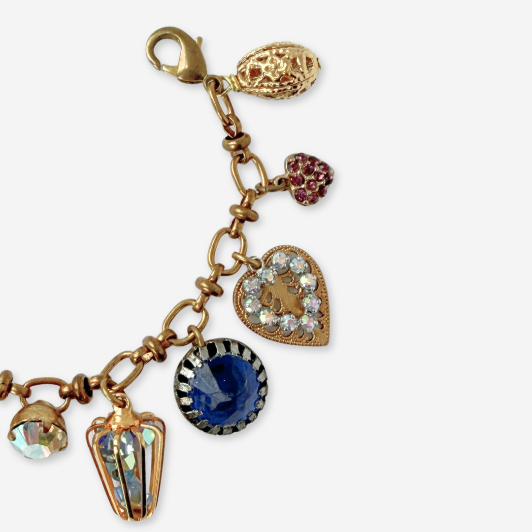Repurposed vintage pink and blue mixed charm bracelet