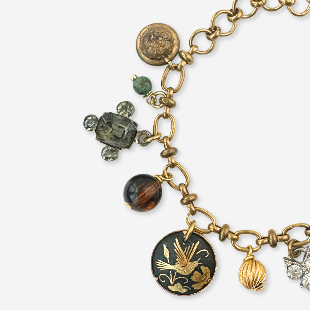 Repurposed vintage mixed charm bracelet