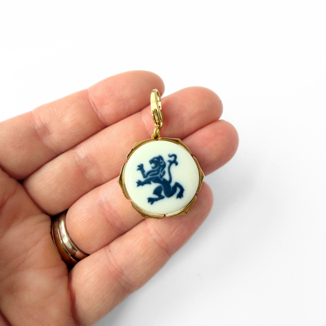 Refashioned vintage blue and white ceramic Denmark heraldic lion charm