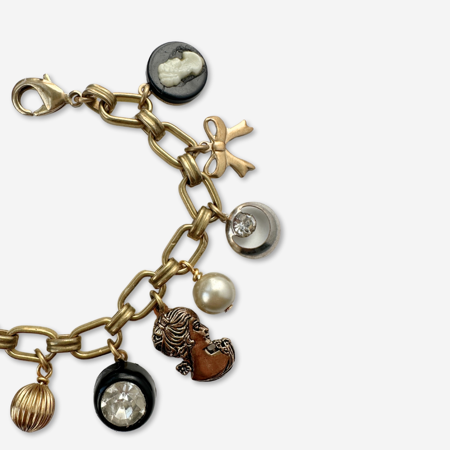 Repurposed vintage black and brass charm bracelet