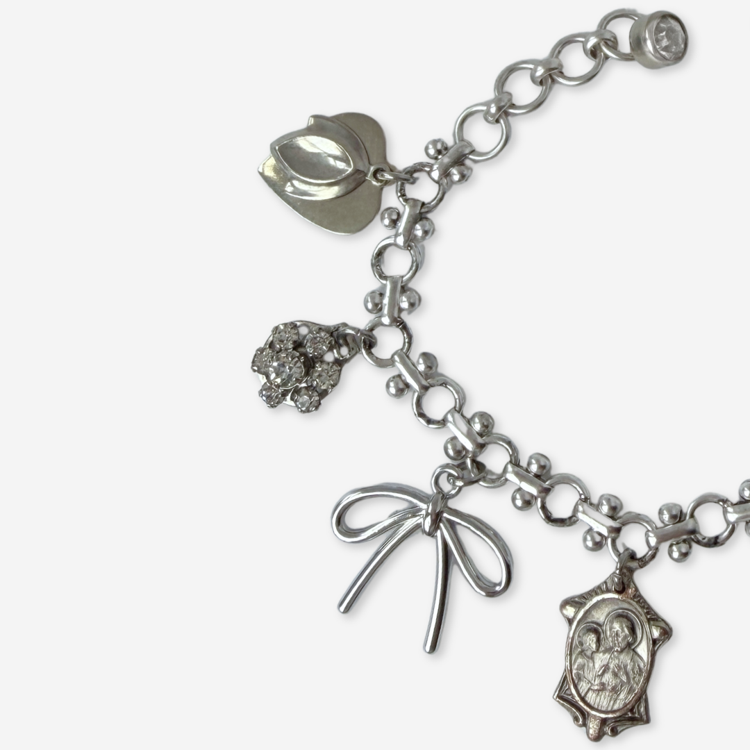 Repurposed vintage mixed silver religious charm bracelet