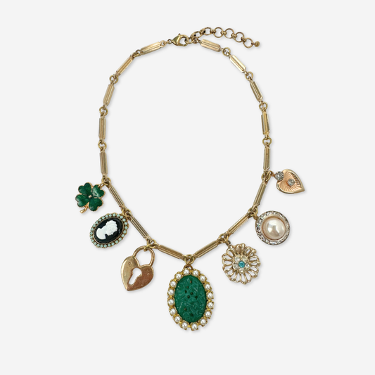 Repurposed vintage green and gold mixed charm necklace