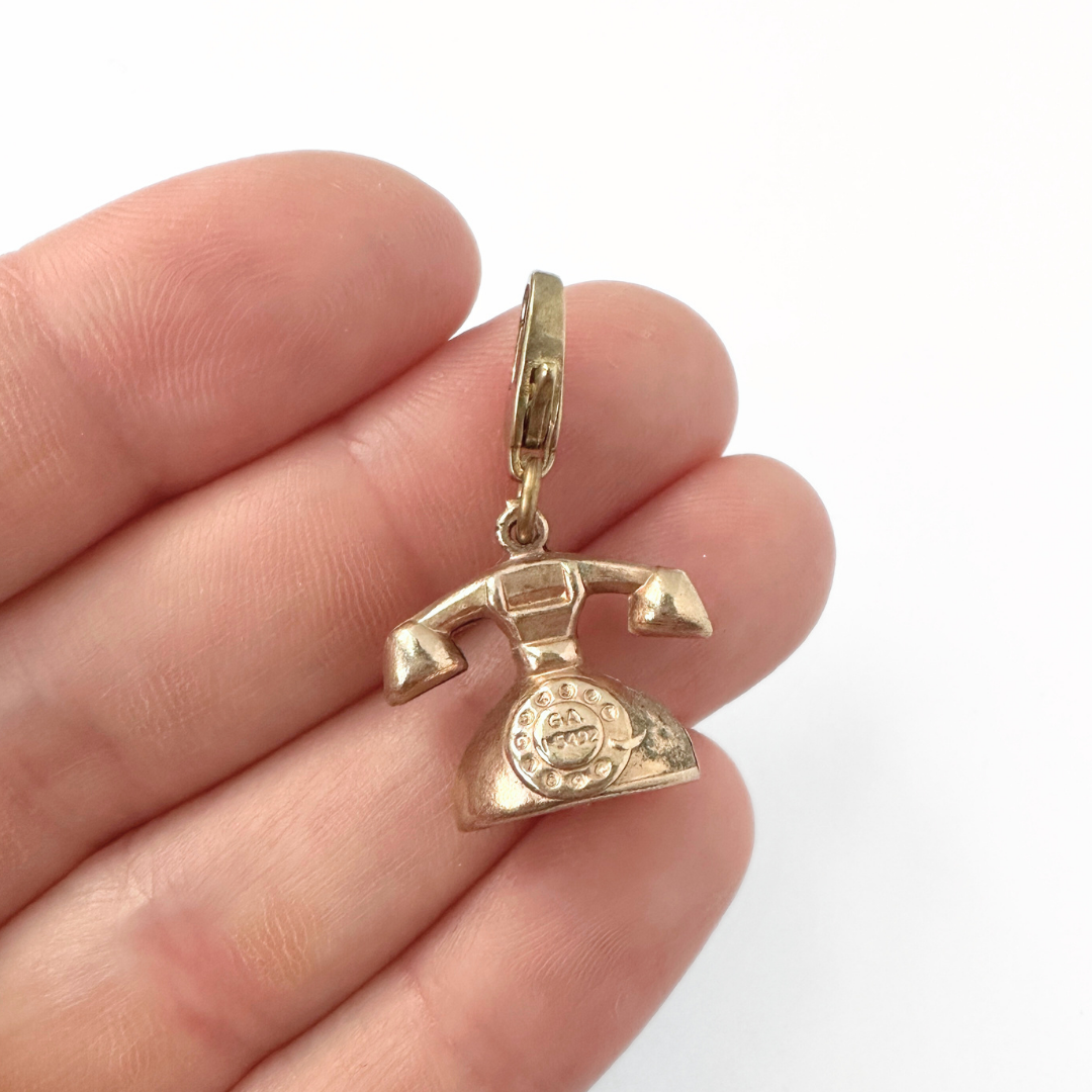 Small vintage muted gold rotary phone charm