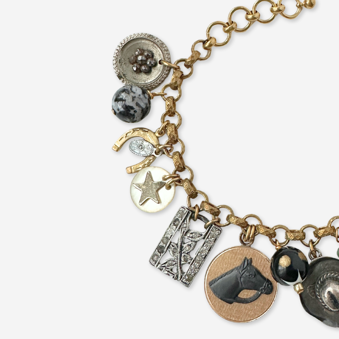 Western themed loaded vintage charm bracelet