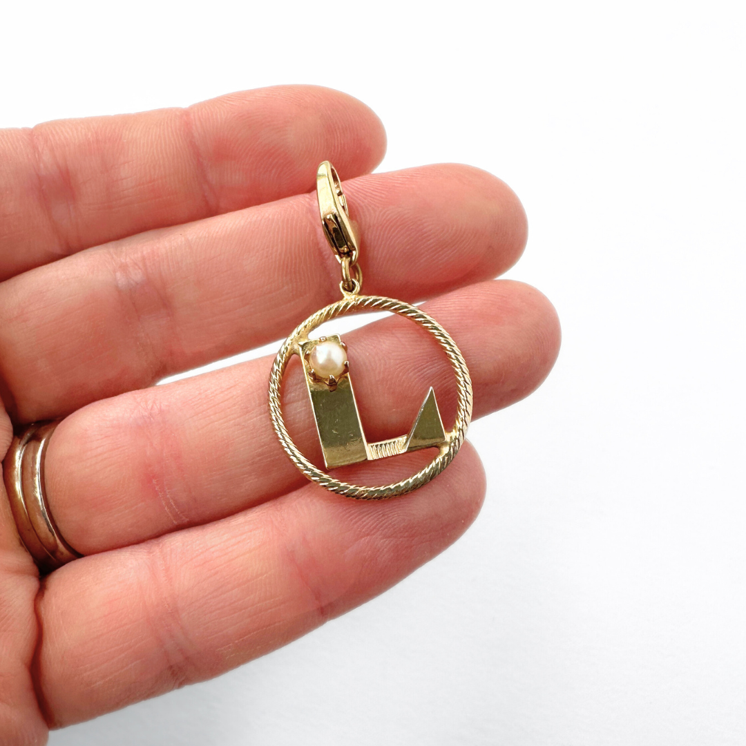 Vintage Gold and pearl letter "L" circular charm