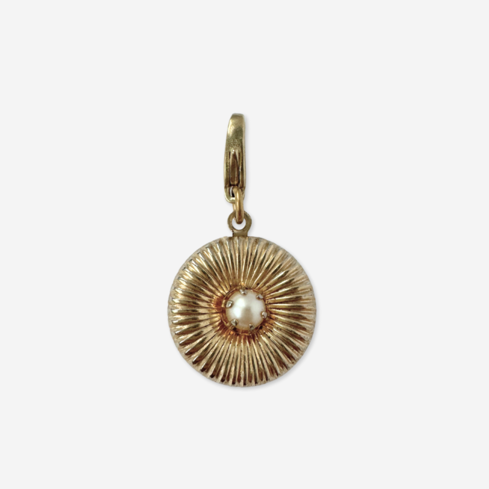 Small vintage ribbed circular gold charm with pearl center