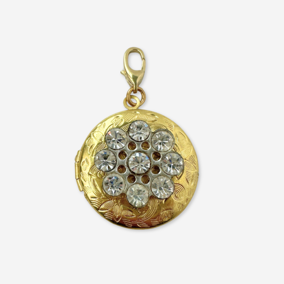Vintage etched brass circular locket charm with clear rhinestones