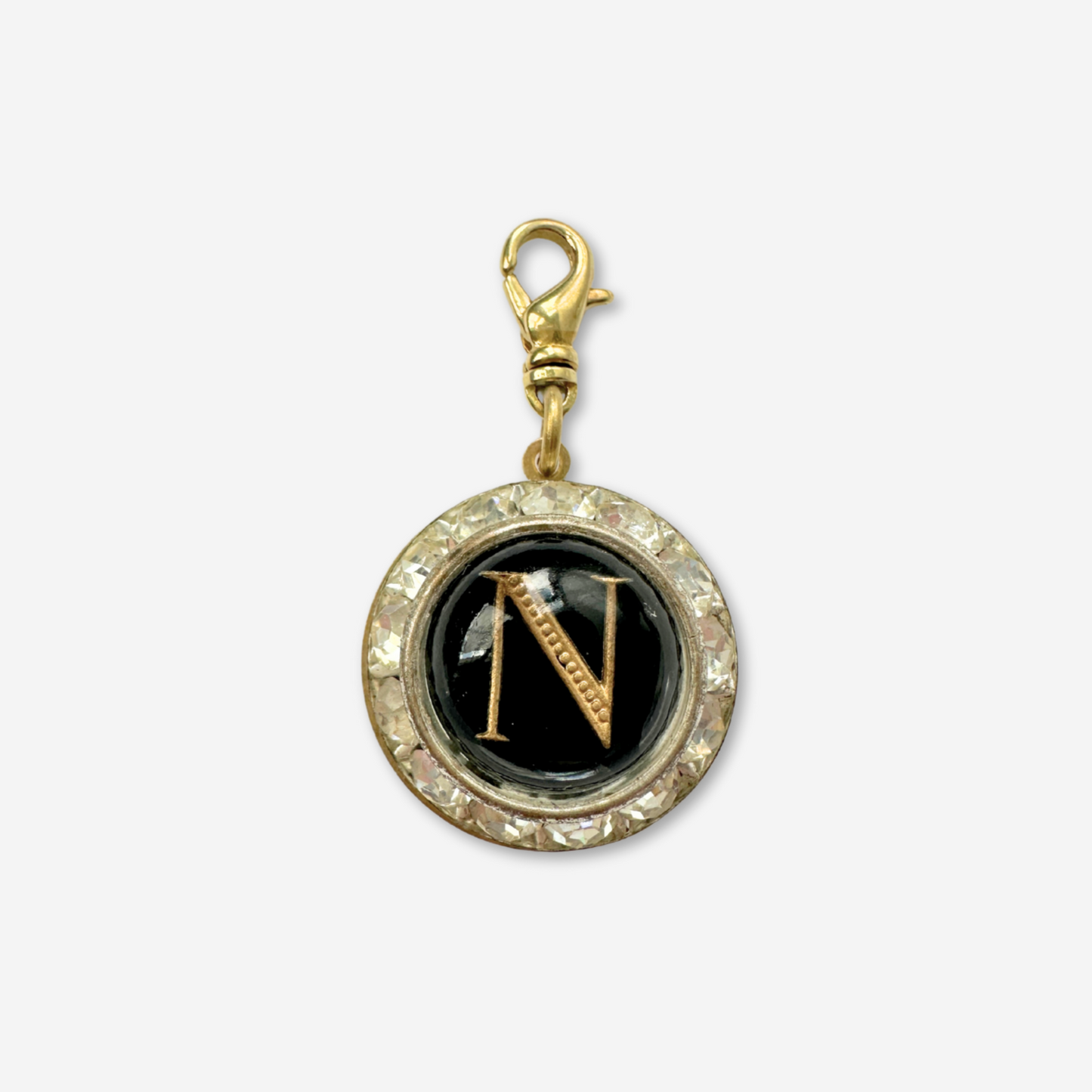 Vintage black letter "N" charm in clear rhinestone round setting