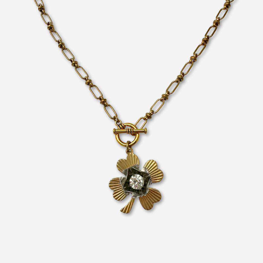 Large solid brass four leaf clover pendant with vintage clear rhinestone embellishment on brass toggle chain