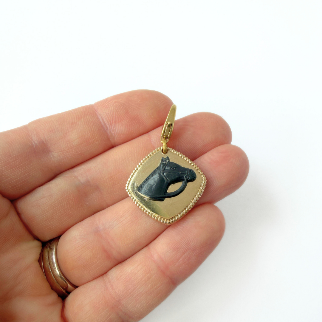 Vintage gold plated and black acrylic horse head charm