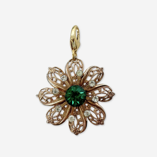 Vintage large brass filigree flower charm with green rhinestone center