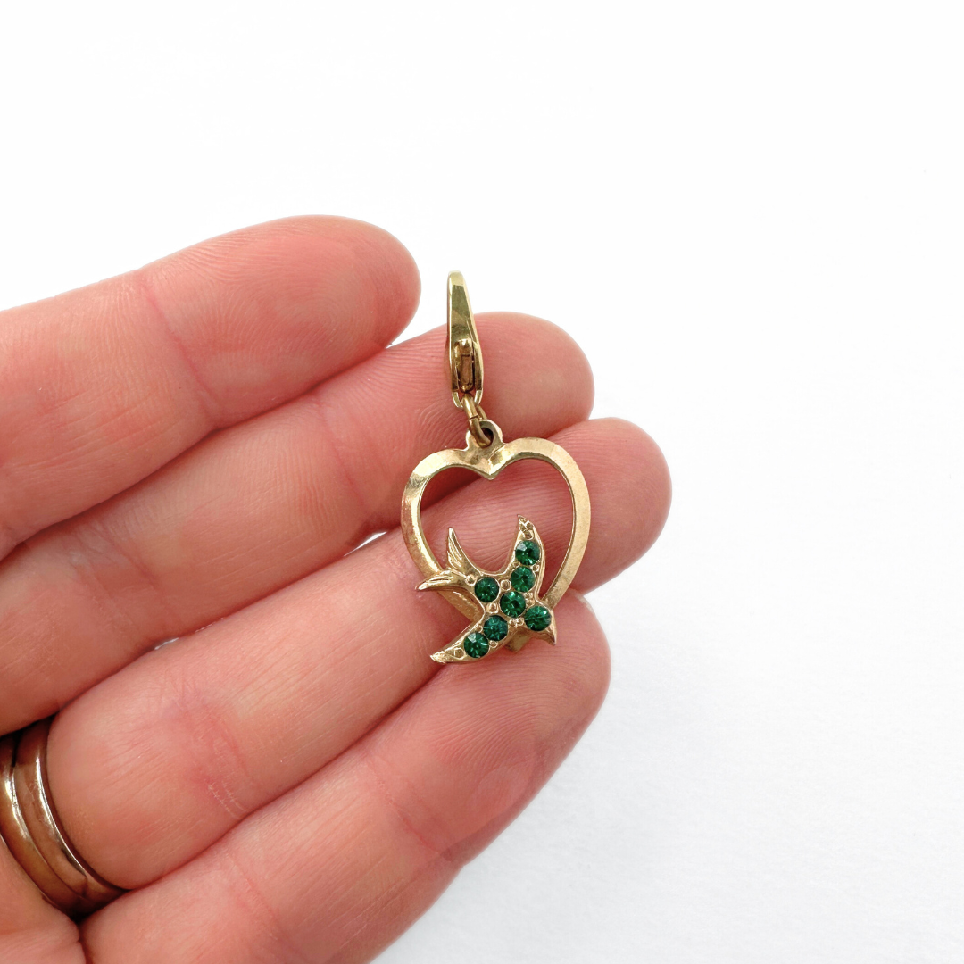 Vintage small gold heart charm with green rhinestone bird