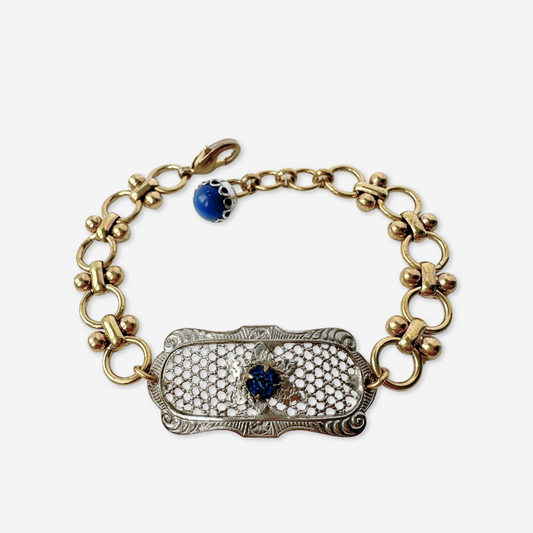 Repurposed antique oval silver mesh bracelet with blue rhinestone centerpiece
