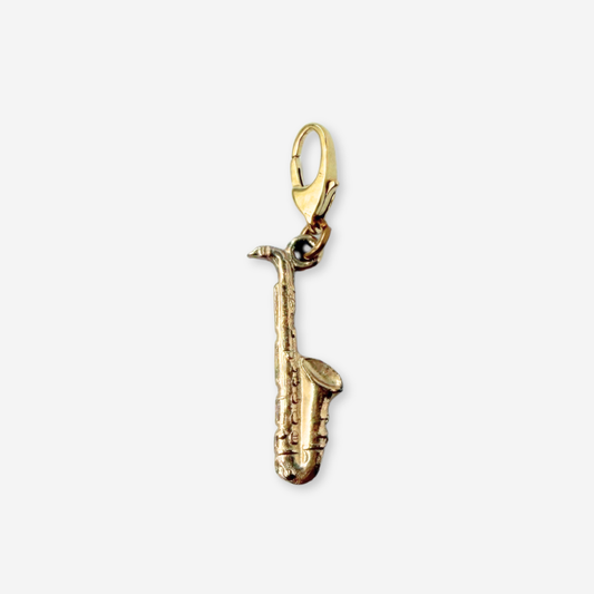 Vintage muted gold saxophone charm pendant