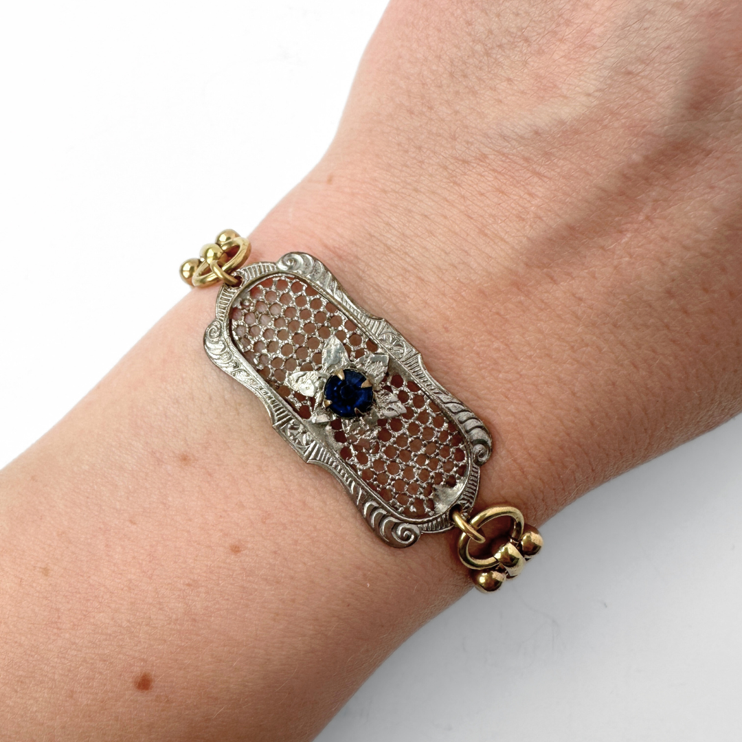 Repurposed antique oval silver mesh bracelet with blue rhinestone centerpiece