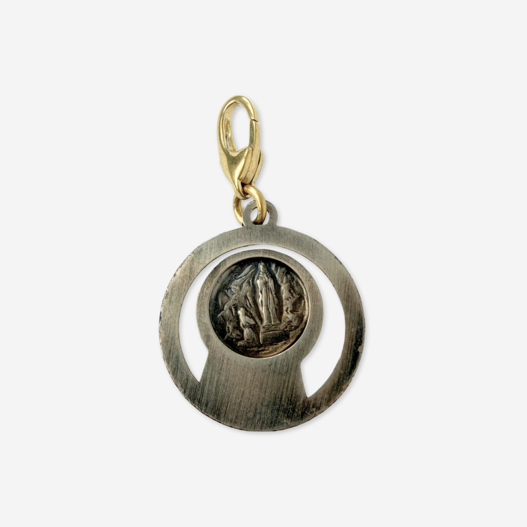 Vintage aged silver Blessed mother circular charm