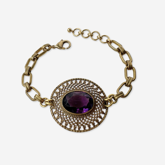Repurposed antique oval filigree bracelet with purple glass centerpiece