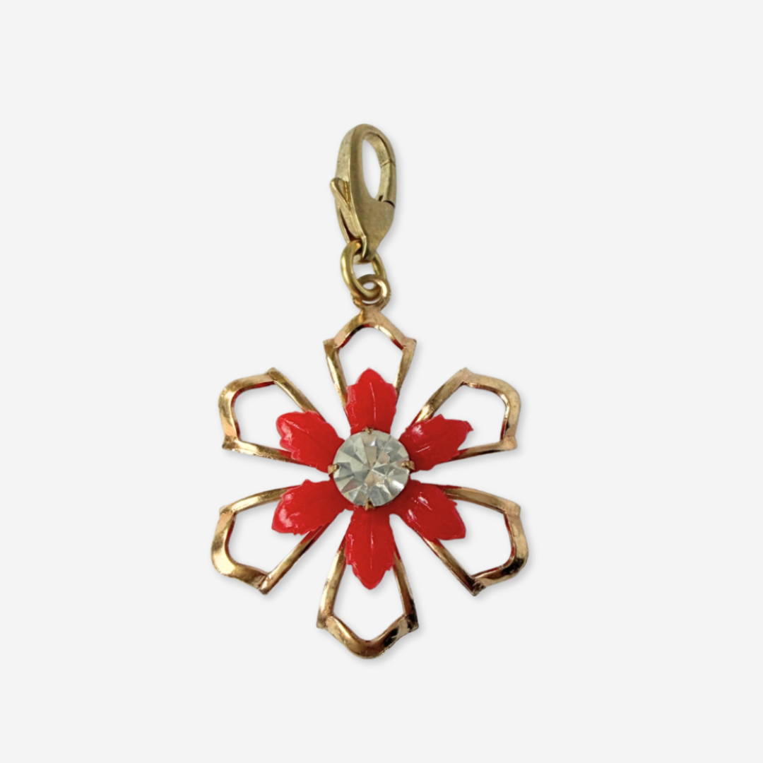Vintage red and gold open flower charm with rhinestone center