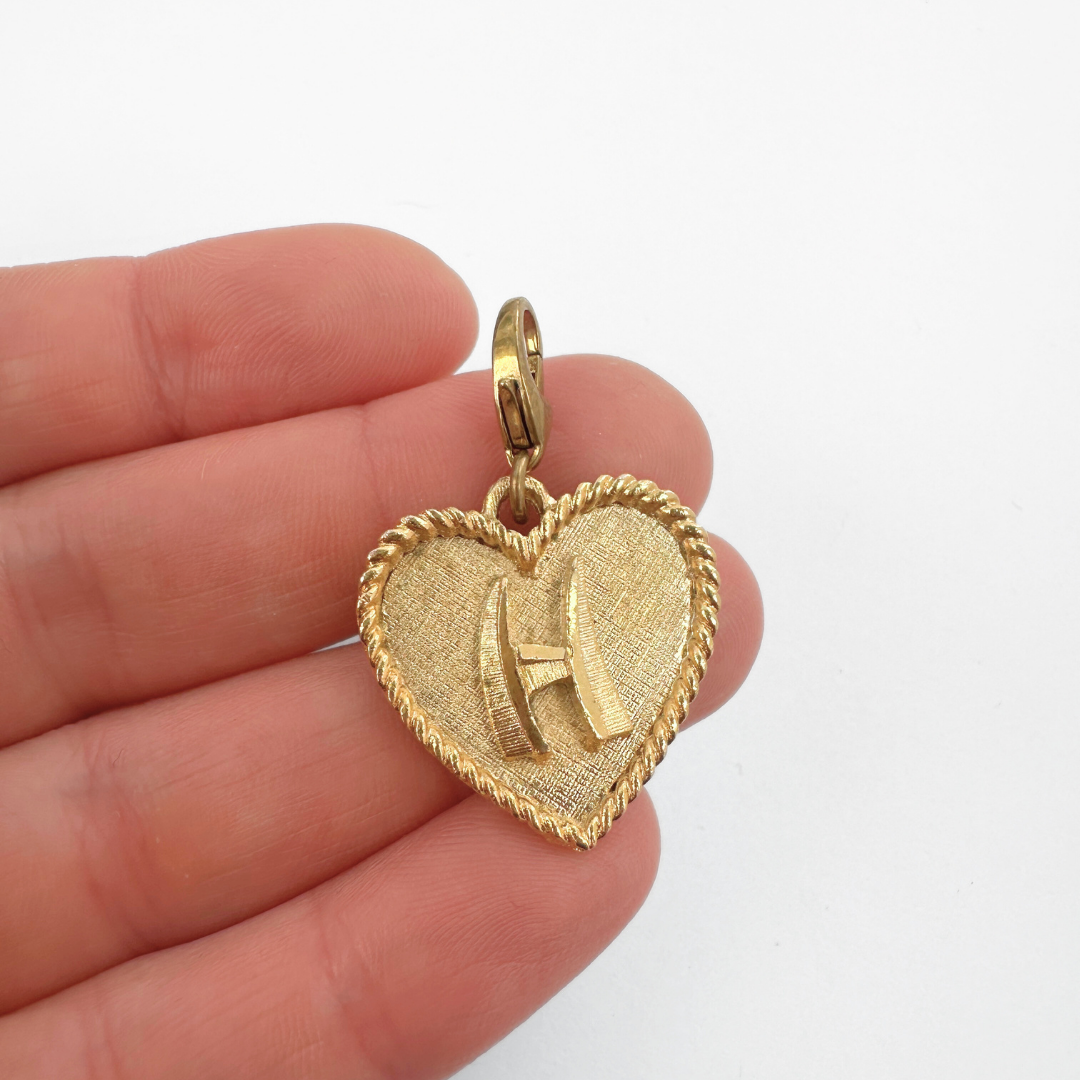VIntage matte gold heart shaped "H" monogram charm