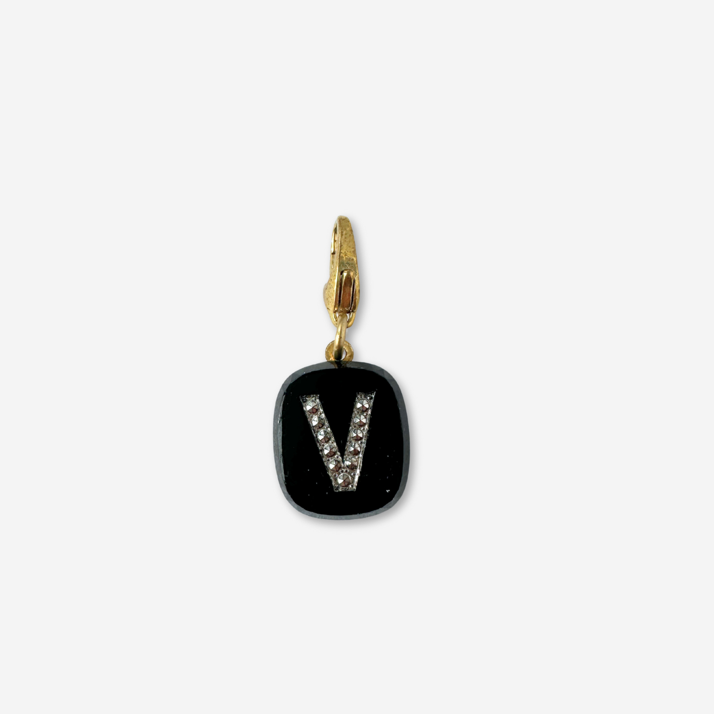 Vintage black glass letter "V" charm