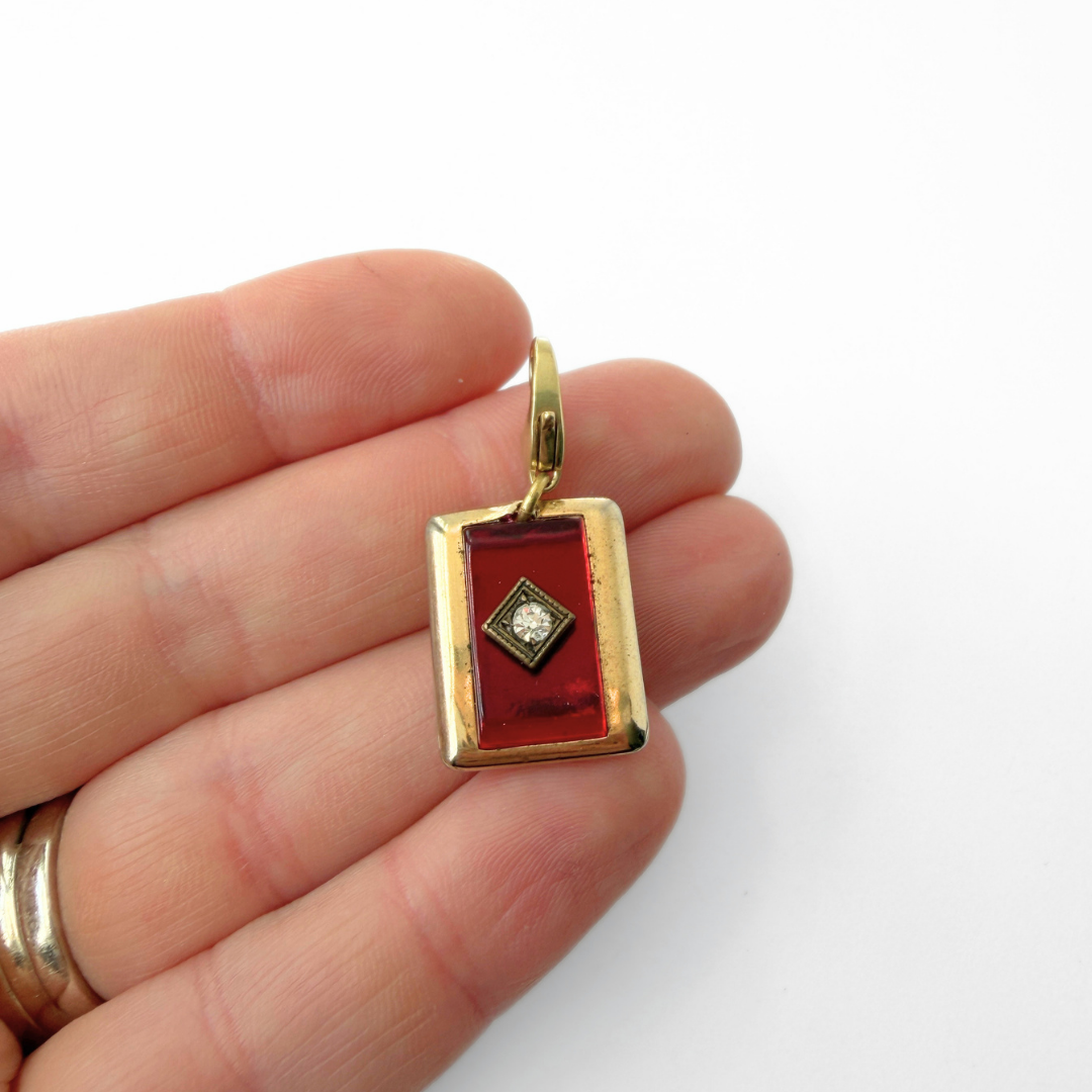 Vintage gold plated and red glass deco rectangular charm