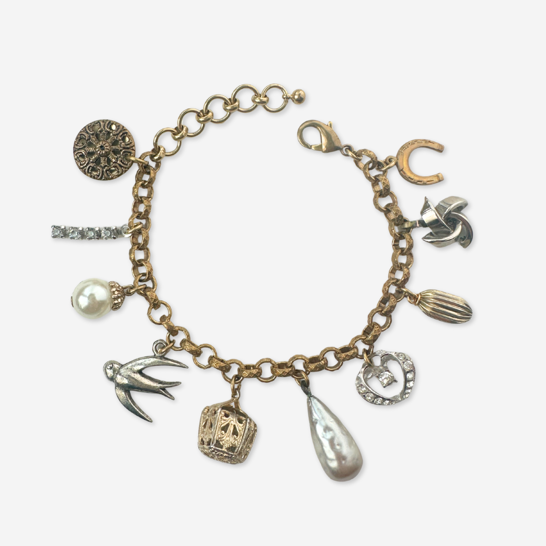 Repurposed vintage neutral mixed charm bracelet