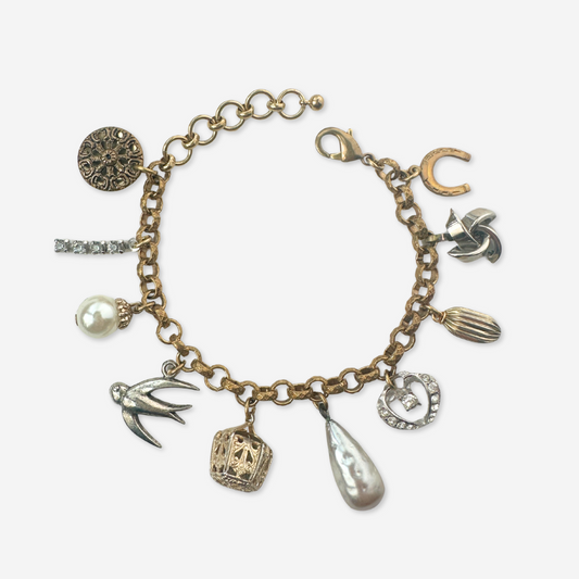 Repurposed vintage neutral mixed charm bracelet