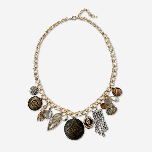 Repurposed vintage neutral charm necklace on gold plated chain
