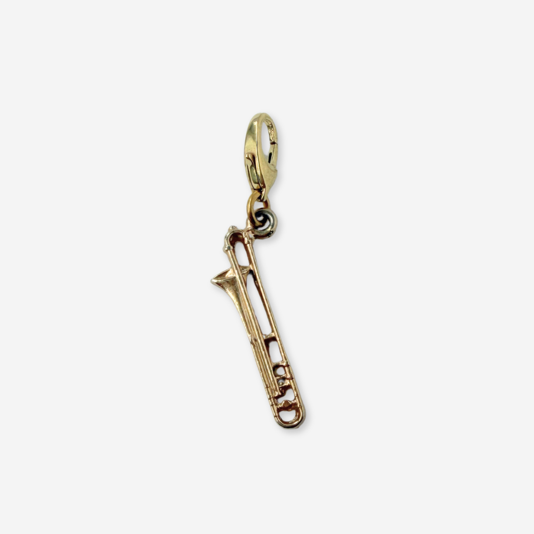 Vintage muted gold trombone charm pendant