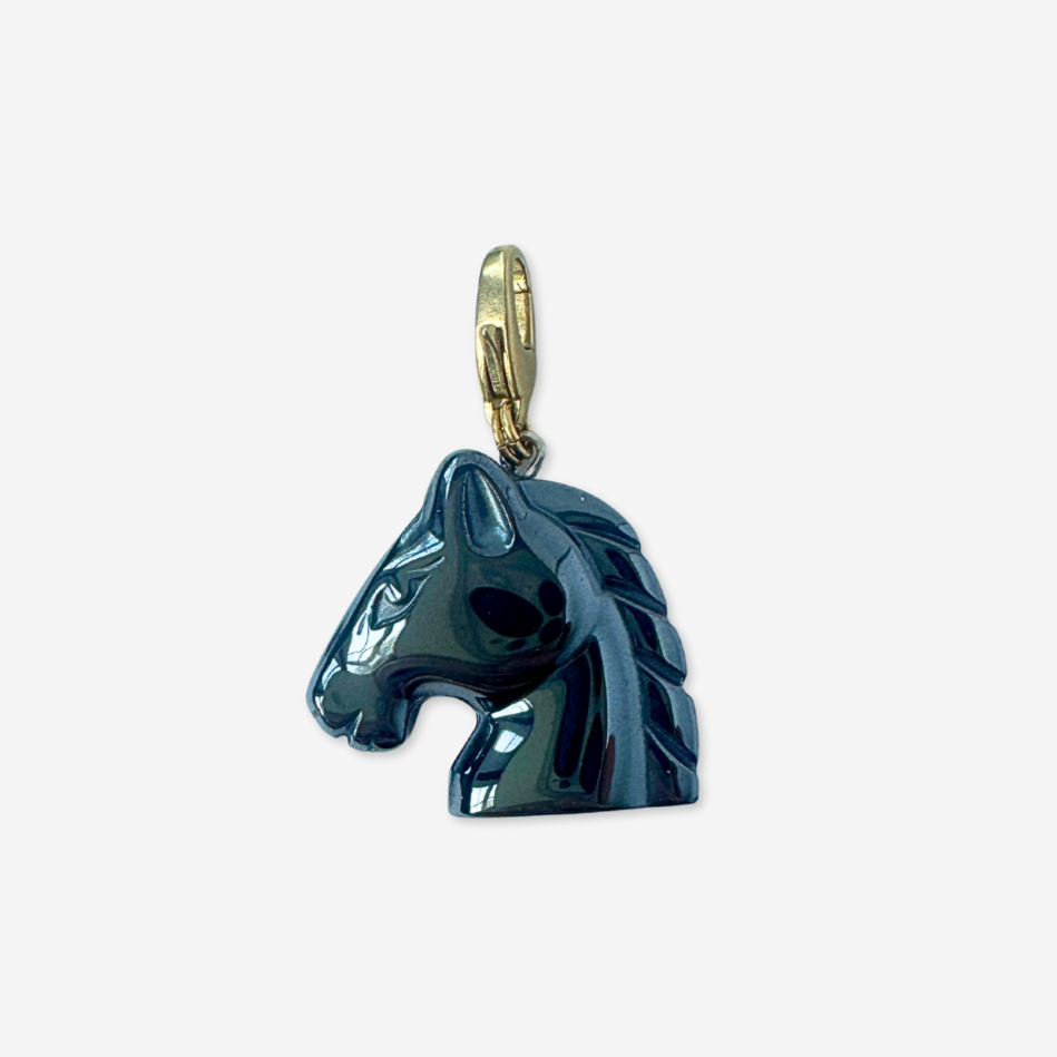 Vintage carved hematite horse head charm