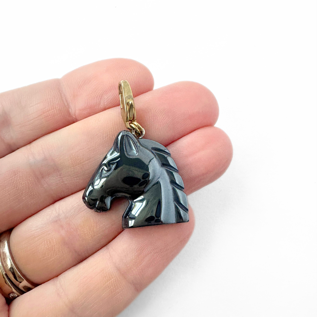 Vintage carved hematite horse head charm