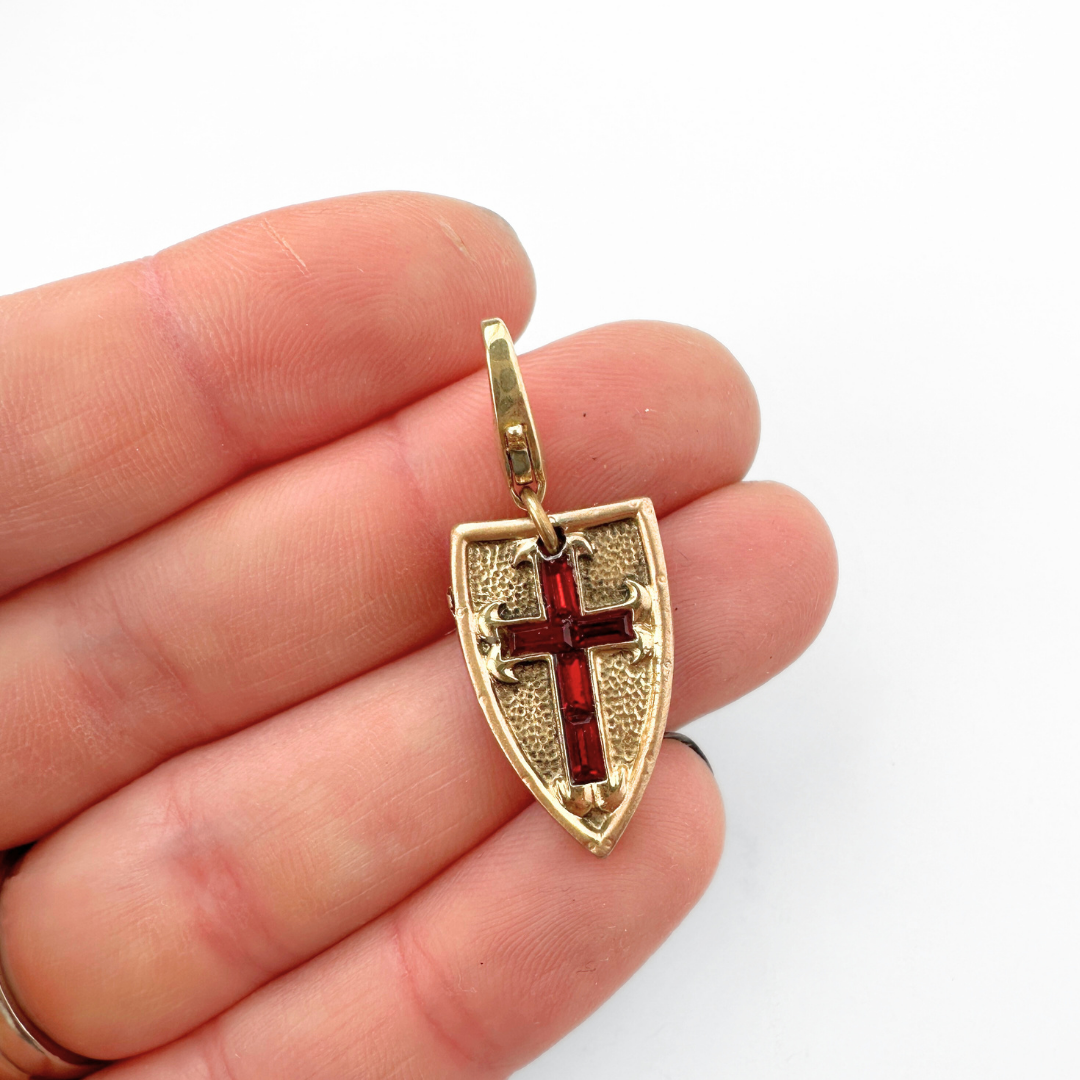 Vintage gold shield charms with red rhinestone cross