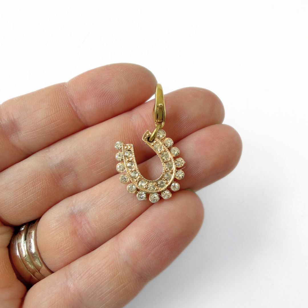 Vintage gold tone rhinestone horseshoe charm
