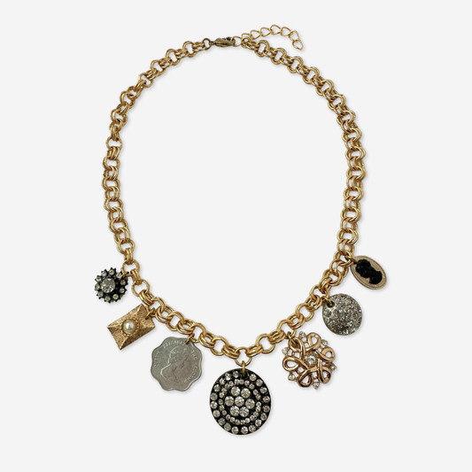 Repurposed vintage neutral charm necklace on gold plated chain