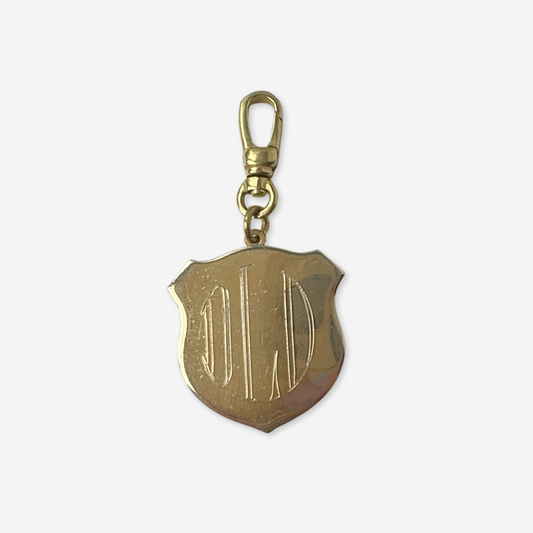 Vintage gold plated large crest charm with "OLD" monogram engraving