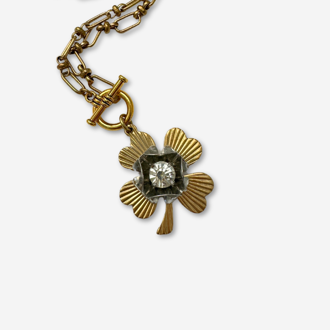 Large solid brass four leaf clover pendant with vintage clear rhinestone embellishment on brass toggle chain