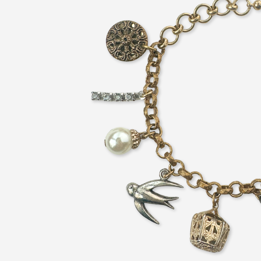 Repurposed vintage neutral mixed charm bracelet