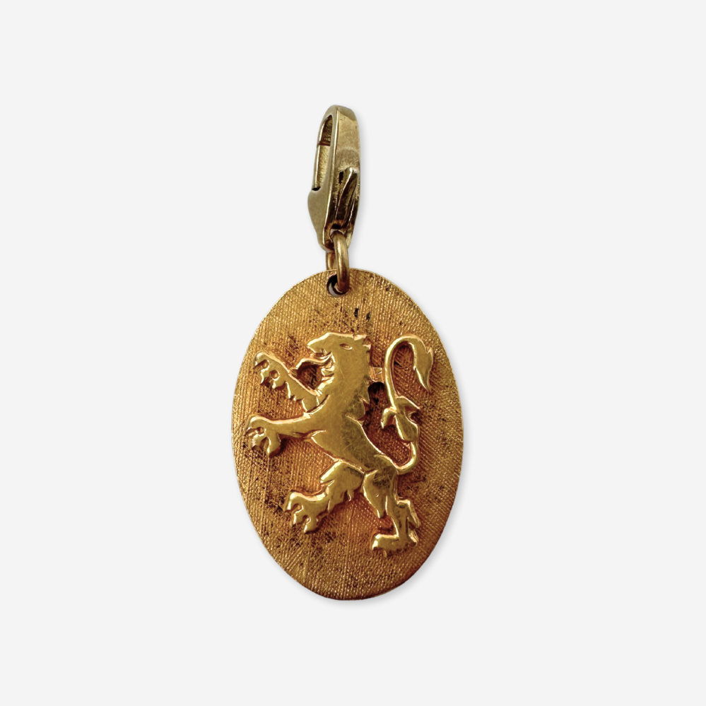 Vintage gold tone Heraldic Lion oval charm