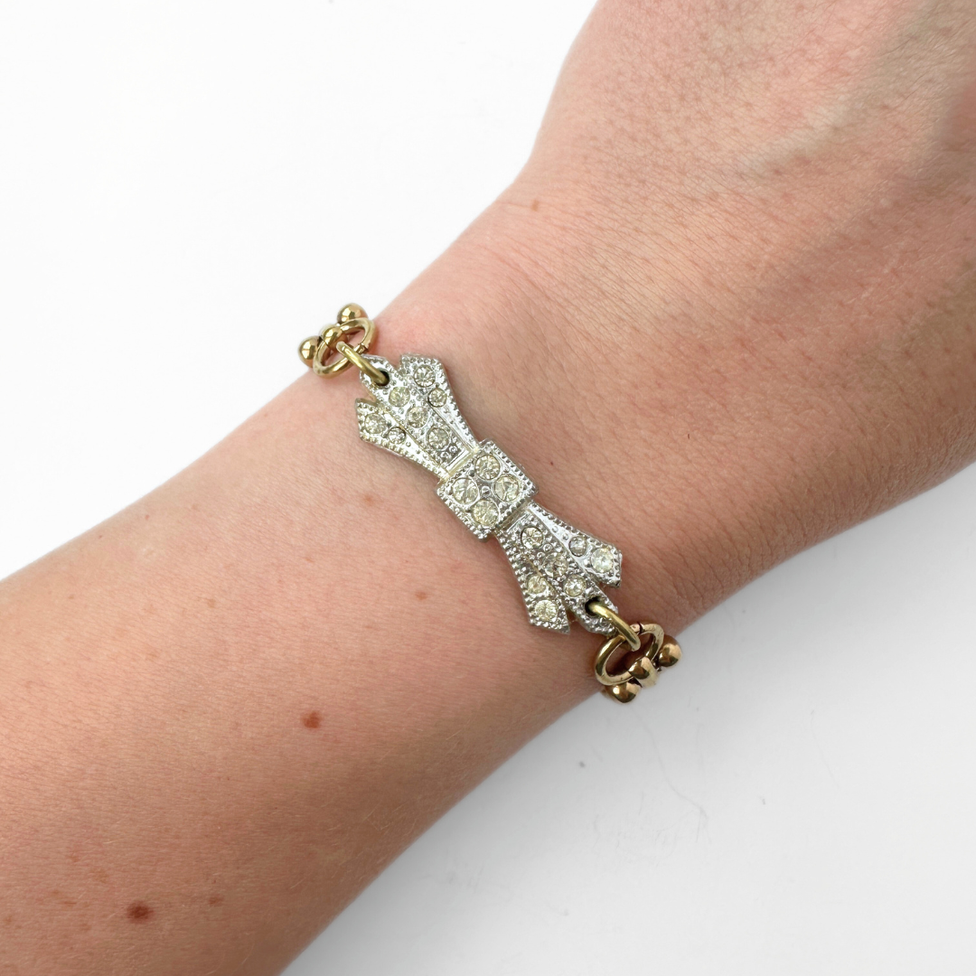 Refashioned vintage clear rhinestone bow bracelet with brass chain