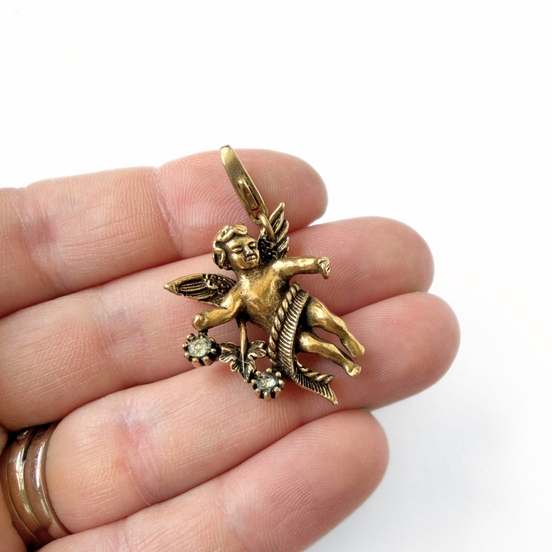 Vintage antique brass cherub angel charm