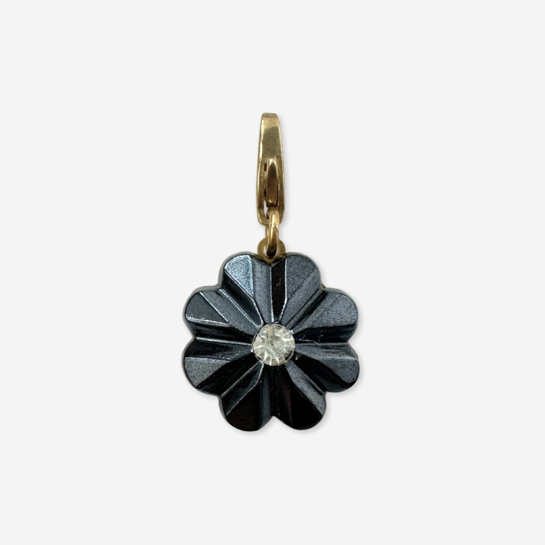 Vintage carved hematite flower charm with rhinestone center
