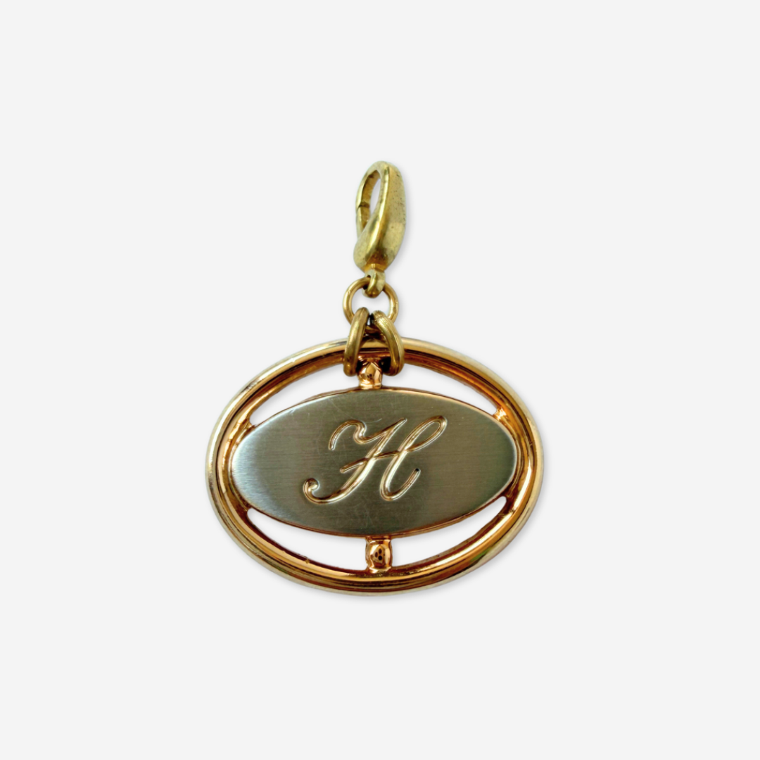 Vintage mixed metal oval "H" monogram charm